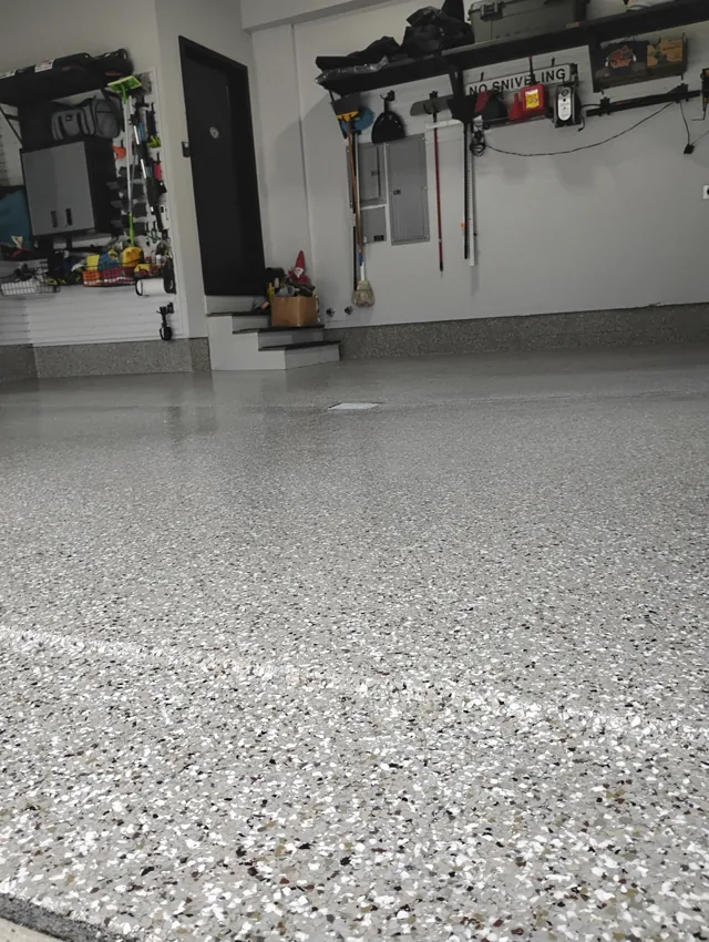 Decorative floor coating across a finished two-car garage